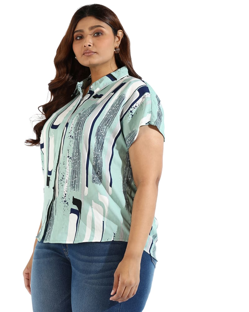 Side of a model wearing a size 3XL Women Graphic Design Shirts in Mint by Instafab Plus. | dia_product_style_image_id:294345